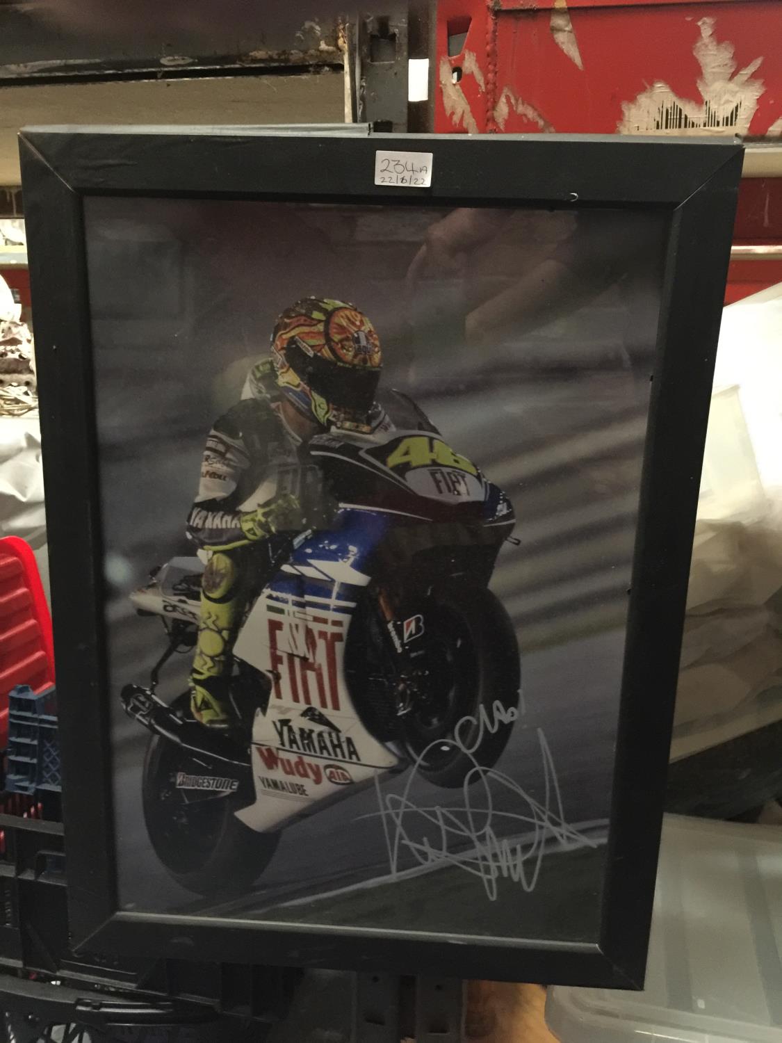 A FRAMED PRINT OF VALENTINO ROSSI ON A YAMAHA FIAT NO. 46 - SIGNED- NO AUTHENTICATION