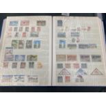 A STAMP ALBUM OF INTERNATIONAL STAMPS TO INCLUDE SWITZERLAND, SOUTH AFRICA, NORWAY, BARBADOS,