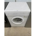 A WHITE LOGIK TUMBLE DRYER BELIEVED IN WORKING ORDER BUT NO WARRANTY