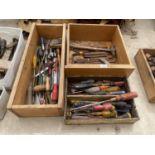 AN ASSORTMENT OF TOOLS TO INCLUDE SCREW DRIVERS, SPANNERS AND CHISELS ETC