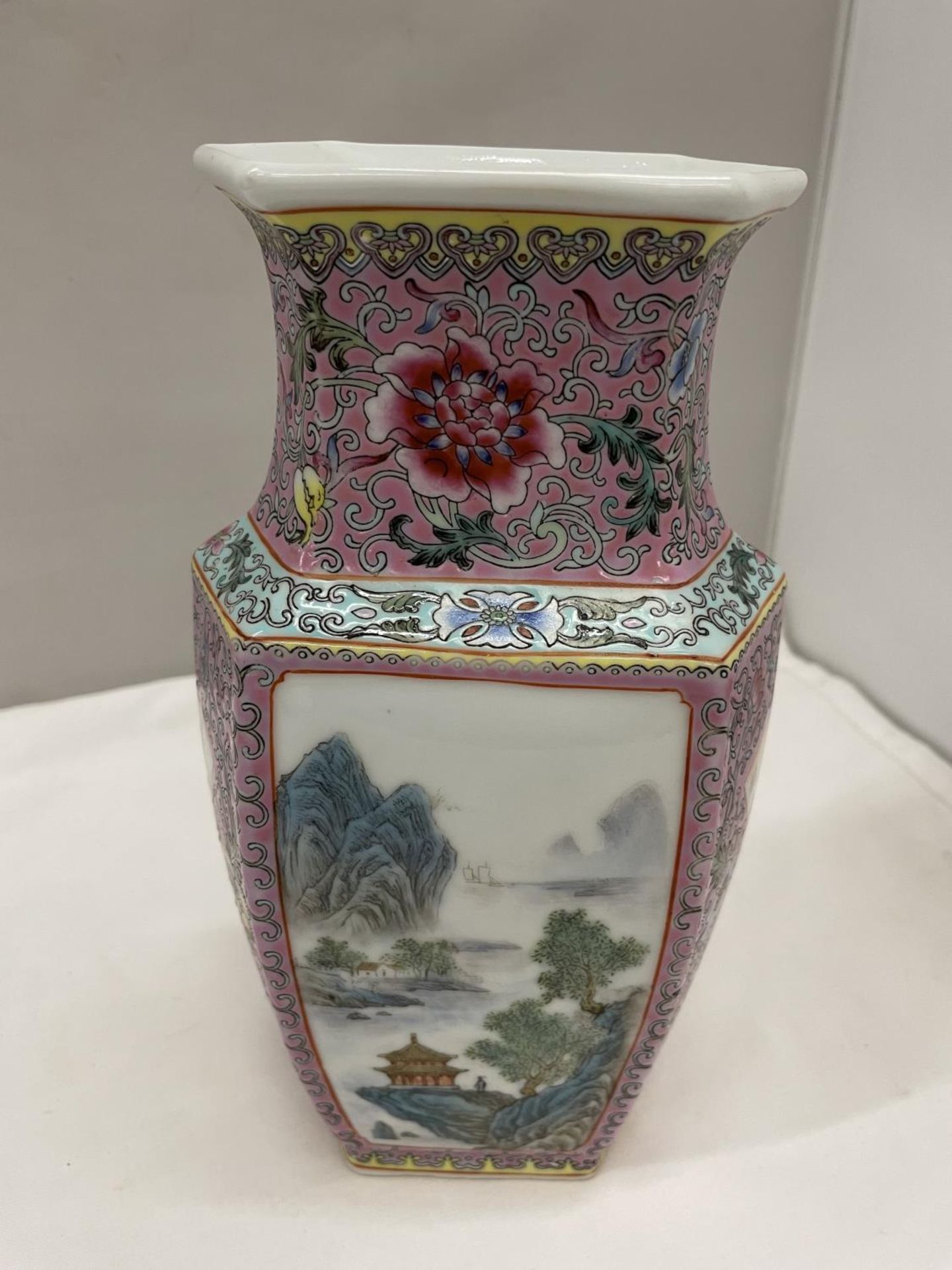 A SIGNED ORIENTAL ENAMELED VASE