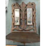 AN ORNATE VICTORIAN SMALL DOUBLE WALL MIRROR