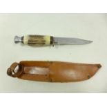 A BOWIE KNIFE AND SCABBARD 10.5 CM BLADE