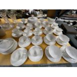 A QUANTITY OF WEDGWOOD CHINA WHITE CUPS, SAUCERS, PLATES, SAUCE BOAT, TUREEN, ETC