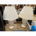 A PAIR OF TABLE LAMPS COMPLETE WITH SHADES