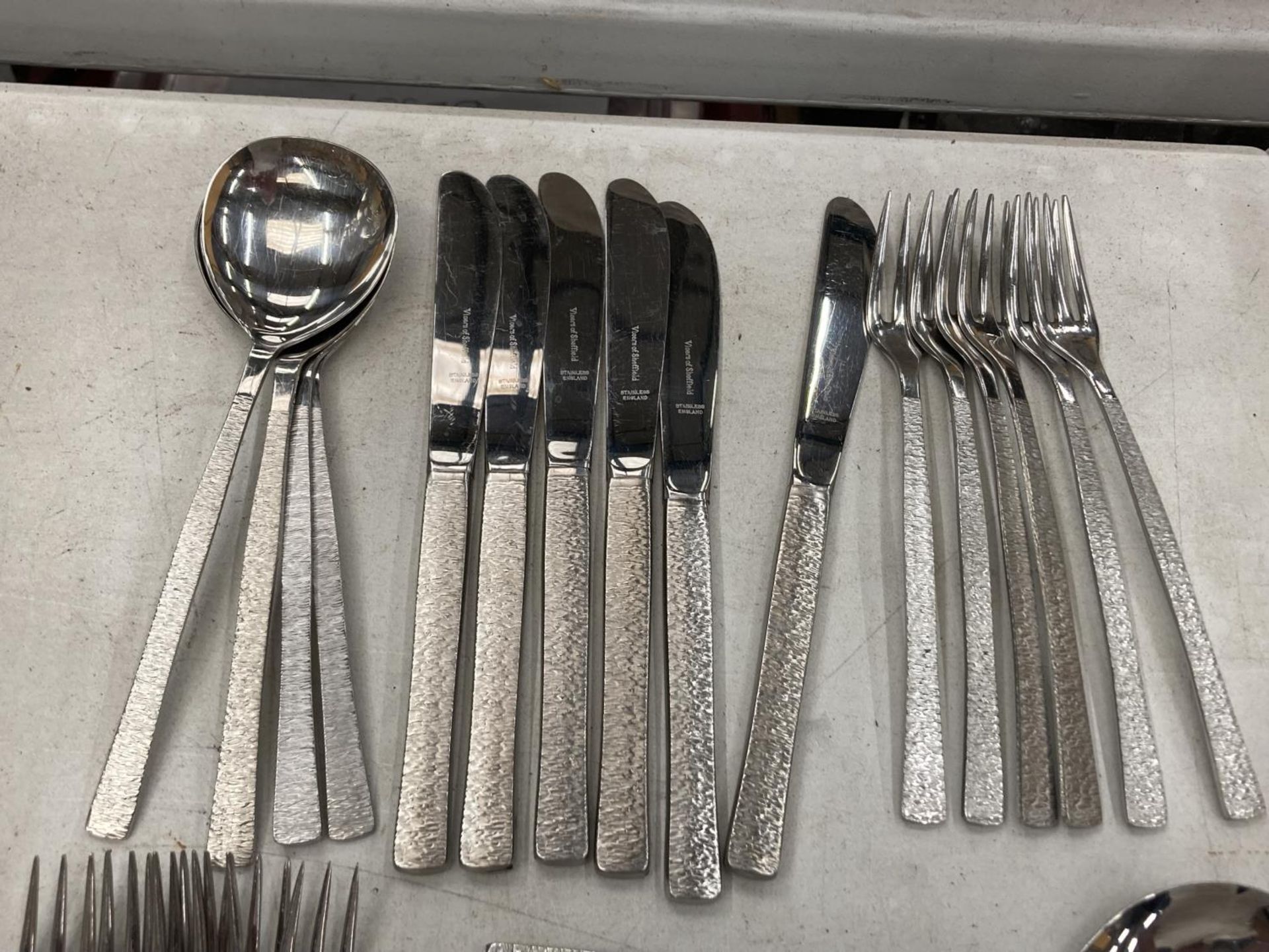 A QUANTITY OF FLATWARE TO INCLUDE KNIVES, FORKS, SPOONS, SERVERS, ETC - Image 2 of 4