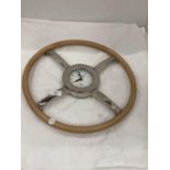 A VINTAGE DANIEL AND ASHLEY CHROME AND LEATHER STEERING WHEEL WALL CLOCK