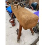 A VINTAGE POMMEL HORSE WITH HOOP BARS, ON FOUR ADJUSTABLE LEGS, 67X27" MAX, WITH SUEDE TOP