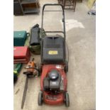 A CHAMPION LAWN MOWER WITH GRASS BOX AND BRIGGS AND STRATTON PETROL ENGINE