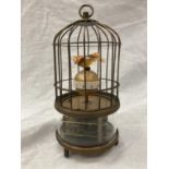 A BRASS BIRDCAGE CLOCK - WORKING AT TIME OF CATALOGUING