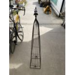 A WROUGHT IRON GARDEN PLANT STAND