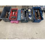 A COLLECTION OF TOOL BOXES WITH AN ASSORTMENT OF HAND TOOLS TO INCLUDE WOOD PLANES, CHISELS AND