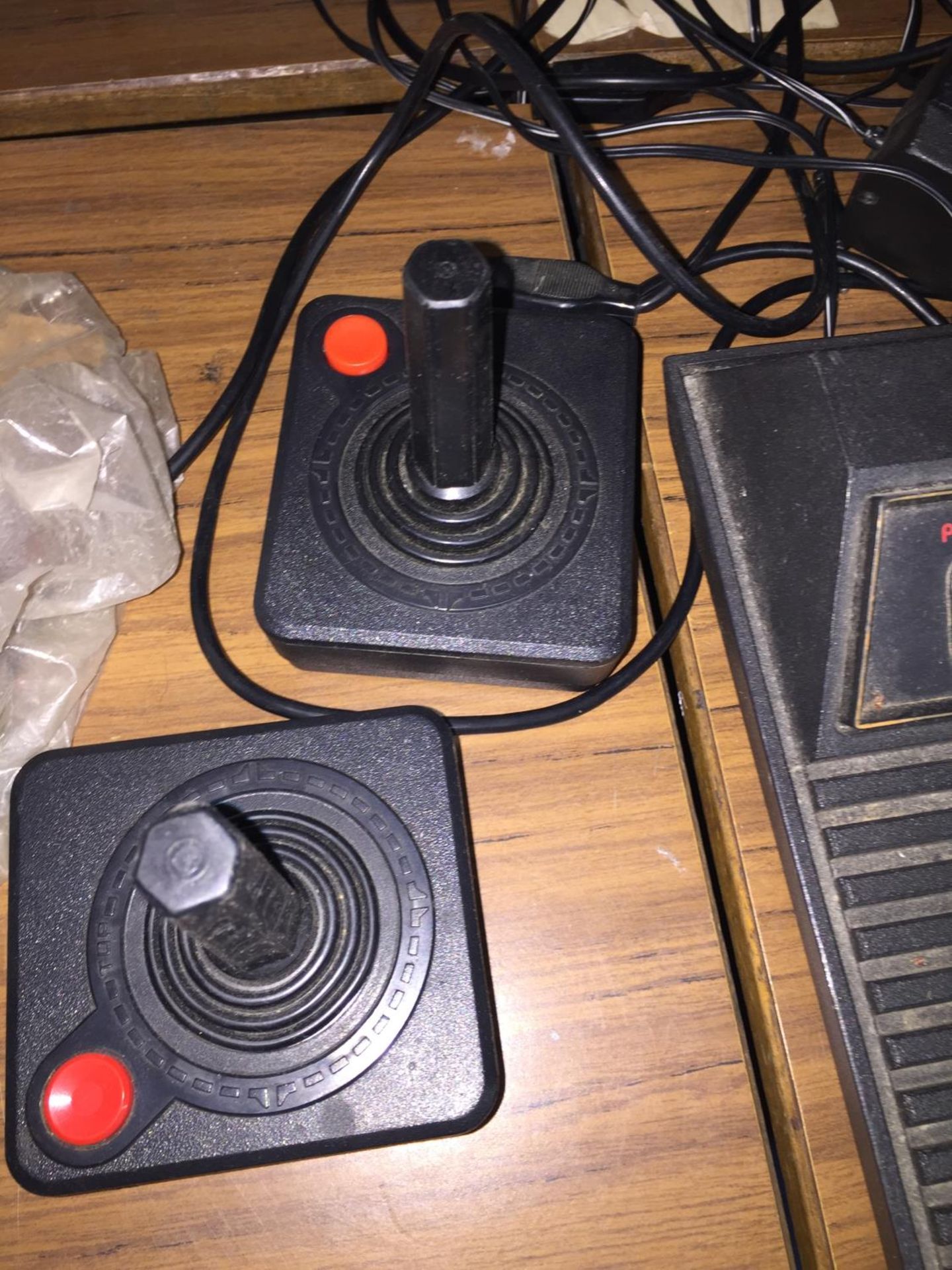 AN ATARI VIDEO COMPUTER SYSTEM WITH TWO JOYSTICKS PLUS FIVE GAMES TO INCLUDE PAC-MAN, SPACE - Image 3 of 4