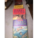 FOUR HARRY POTTER PAPERBACKS TO INCLUDE THE CHAMBER OF SCRETS, THE PHILOSOPHERS STONE, THE ORDER