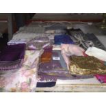 A QUANTITY OF SCARVES AND EVENING BAGS ETC