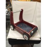 A VINTAGE CHILDREN'S RADIO FLYER PUSH CART