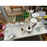 AN ASSORTMENT OF CERAMICS AND GLASS WARE TO INCLUDE BOTTLES, BOWLS AND CUPS ETC