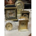 THREE CARRIAGE CLOCKS, A TIMEMASTER MANTLE CLOCK AND A CRYSTAL GLASS CLOCK
