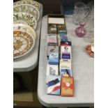 A COLLECTION OF PLAYING CARDS FROM VARIOUS AIRLINES TO INCLUDE BRITISH AIRWAYS, CATHAY PACIFIC,