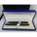 A BOXED SET OF WATERMAN PENS TO INCLUDE A FOUNTAIN PEN AND A BIRO