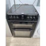 A BLACK BEKO FREESTANDING ELECTRIC OVEN AND HOB