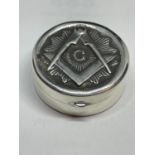 A MARKED SILVER PILL BOX WITH A MASONIC DESIGN