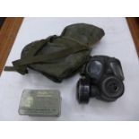 A GAS MASK AND CASE AND A MSA DUSTFOE RESPIRATOR (2)