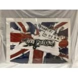 A LARGE SEX PISTOLS 'ANARCHY IN THE UK' POSTER IN A PERSPEX FRAME - 100CM X 70CM