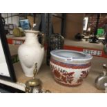 A LARGE PLANTER ORIENTAL STYLE TOGETHER WITH A POT JUG WITH ROPE HANDLE AND A STONE VASE MARKED TO