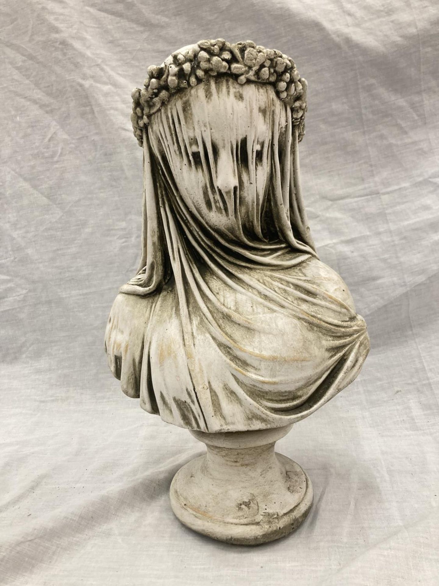 A STONE SCULPTURAL BUST OF THE VEILED MAIDEN - HEIGHT 37CM