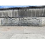 A SET OF 4 GALVANISED GATES & PANELS VIZ MATCHING PAIR OF GALVANISED PANELS 8' WIDE X 6'9" HIGH &