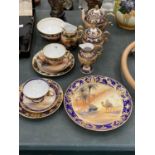 A NORITAKE TEA SET WITH GILT EMBOSSED EGYPTIAN SCENES TO INCLUDE A TEAPOT, CREAM AND MILK JUG, SUGAR