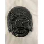 A BLACK STONE MASK 14CM X 12CM