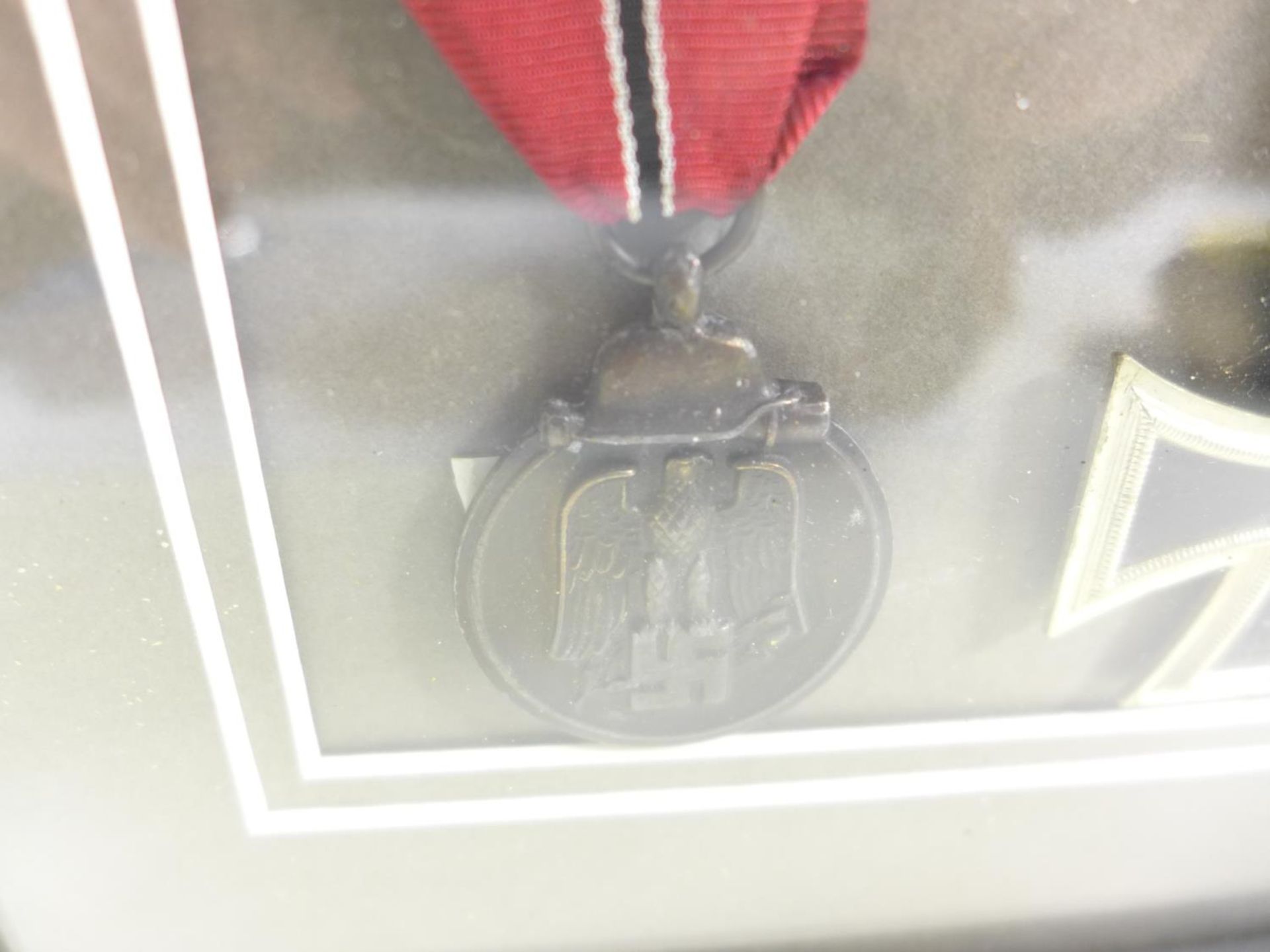 A FRAMED NAZI MEDAL IRON CROSS SECOND CLASS AND A NAZI EASTERN FRONT MEDAL - Image 3 of 5