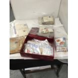 A QUANTITY OF VINTAGE EPHEMERA TO INCLUDE LETTERS, POSTCARDS, STAMPS, ETC
