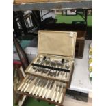 A BOXED CANTEEN OF CUTLERY AND A MAHOGANY BOXED PART CANTEEN OF CUTLERY