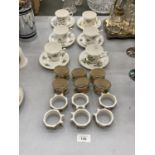A COLLECTION OF ROYAL WINDOR CUPS AND SAUCERS AND 12 DECORATIVE NAPKIN RINGS