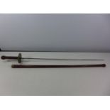 A LATE 19TH CENTURY SWORD STICK 77CM SOLINGEN BLADE WOODEN SCABBARD AND GRIP BRASS GUARD