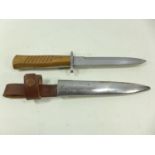 A GERMAN MADE KNIFE AND SCABBARD 14.5 CM BLADE