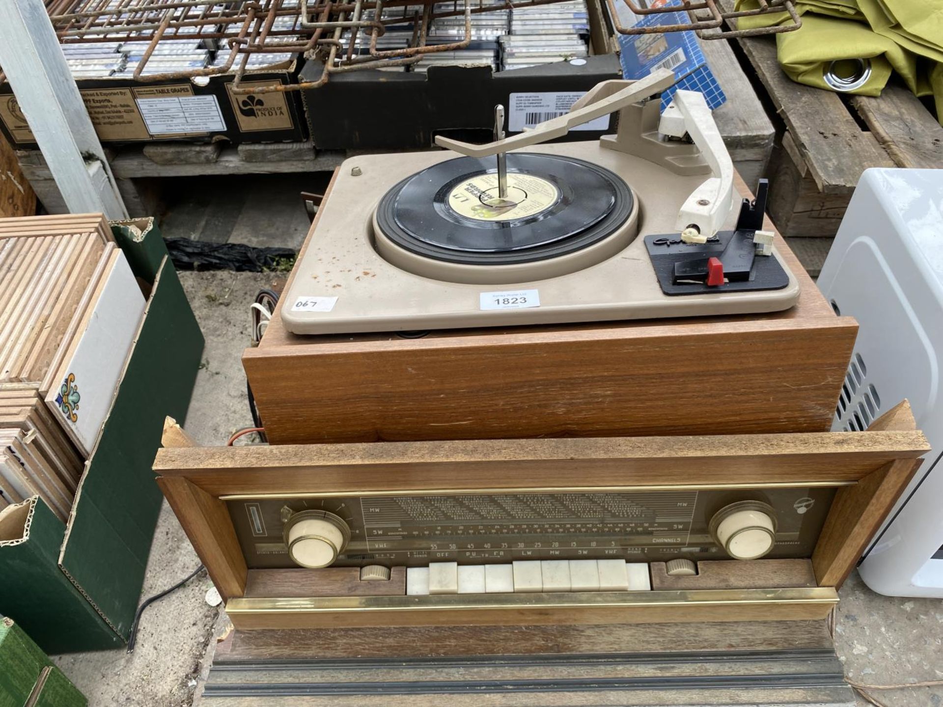 A RECORD DECK AND A VINTAGE RADIO