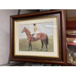 A FRAMED PRINT OF A JOCKEY ON A RACEHORSE (ARKLE?)