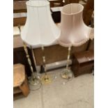 THREE VARIOUS ONYX STANDARD LAMPS, TWO WITH SHADES