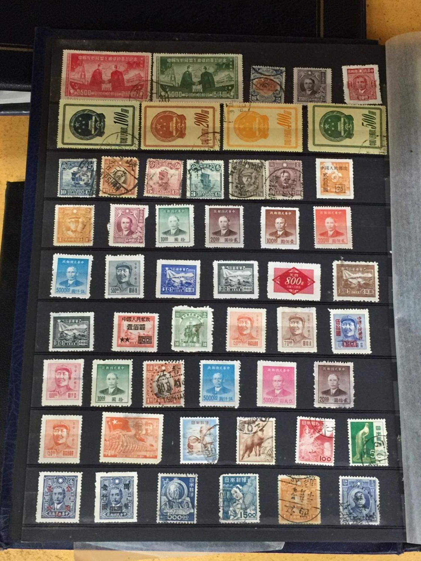 AN ALBUM CONTAINING RARE AND COLLECTABLE MOSTLY ASIAN STAMPS - Image 3 of 7