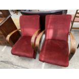 A PAIR OF ART DECO BENTWOOD ARM FIRESIDE CHAIRS