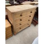A VICTORIAN PINE CHEST OF TWO SHORT AND THREE LONG GRADUATED DRAWERS, 43" WIDE