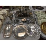 A LARGE QUANTITY OF SILVER PLATED ITEMS TO INCLUDE TRAYS, VASES, PIN DISHES, COASTERS, NAPKIN RINGS,