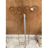 A PAIR OF SMALL HEART SHAPED WROUGHT IRON PLANT SUPPORTS/GARDEN FEATURES