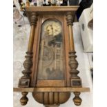 A VINTAGE MAHOGANY CASED WALL CLOCK FOR RESTORATION