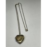 A 9 CARAT GOLD HEAR SHAPED LOCKET AND CHAIN GROSS WEIGHT 6.8 GRAMS