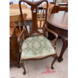 AN EDWARDIAN MAHOGANY AND INLAID ELBOW CHAIR